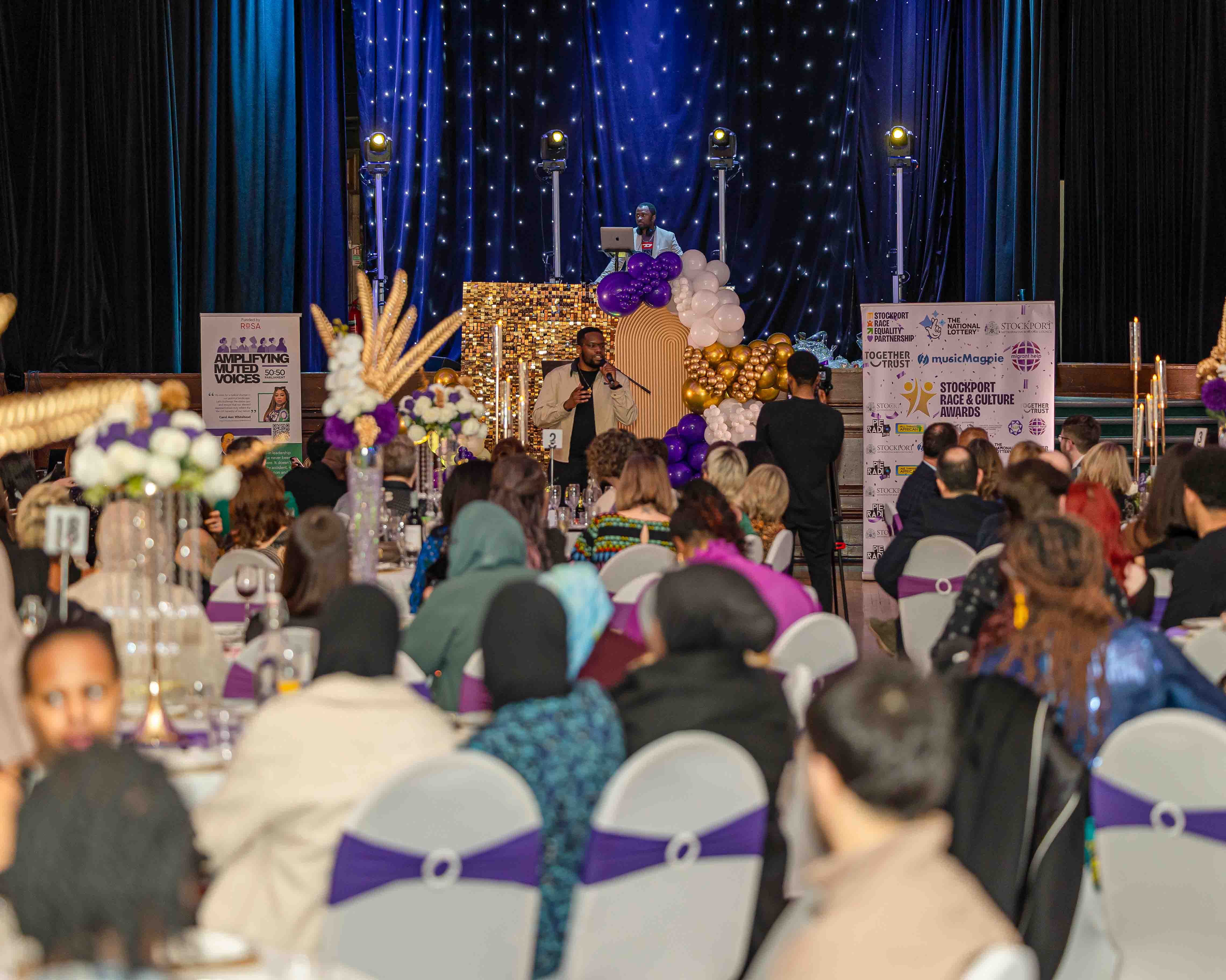 Host addressing the SRACA gala audience from the stage